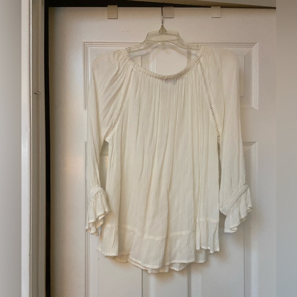 Beige long sleeve top,ruffle at end of sleeve ,can be worn off the shoulder